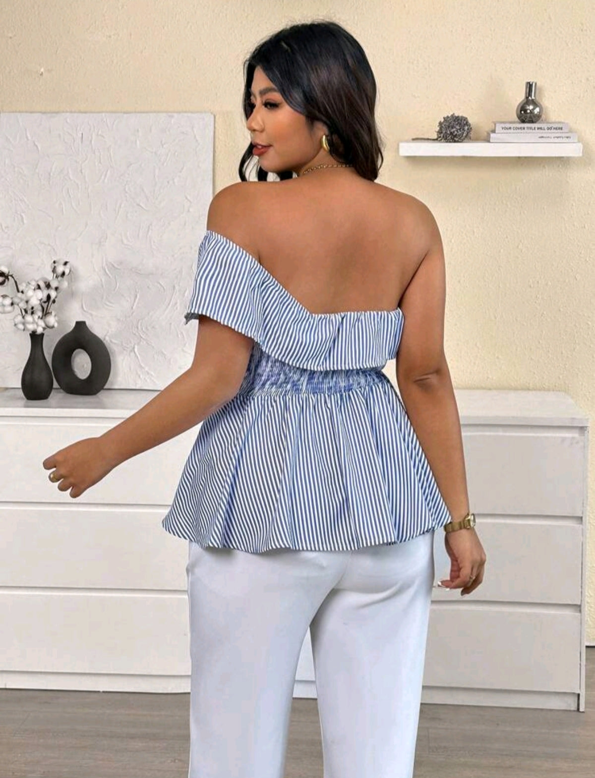 Blusa de rayas y medio hombro