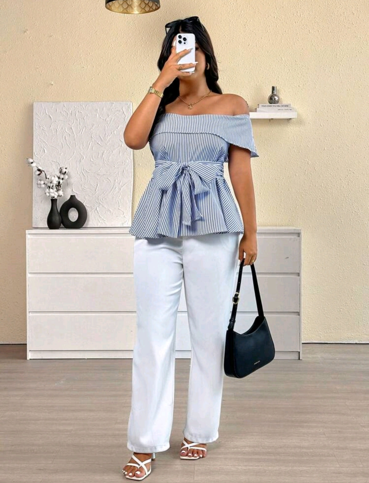 Blusa de rayas y medio hombro