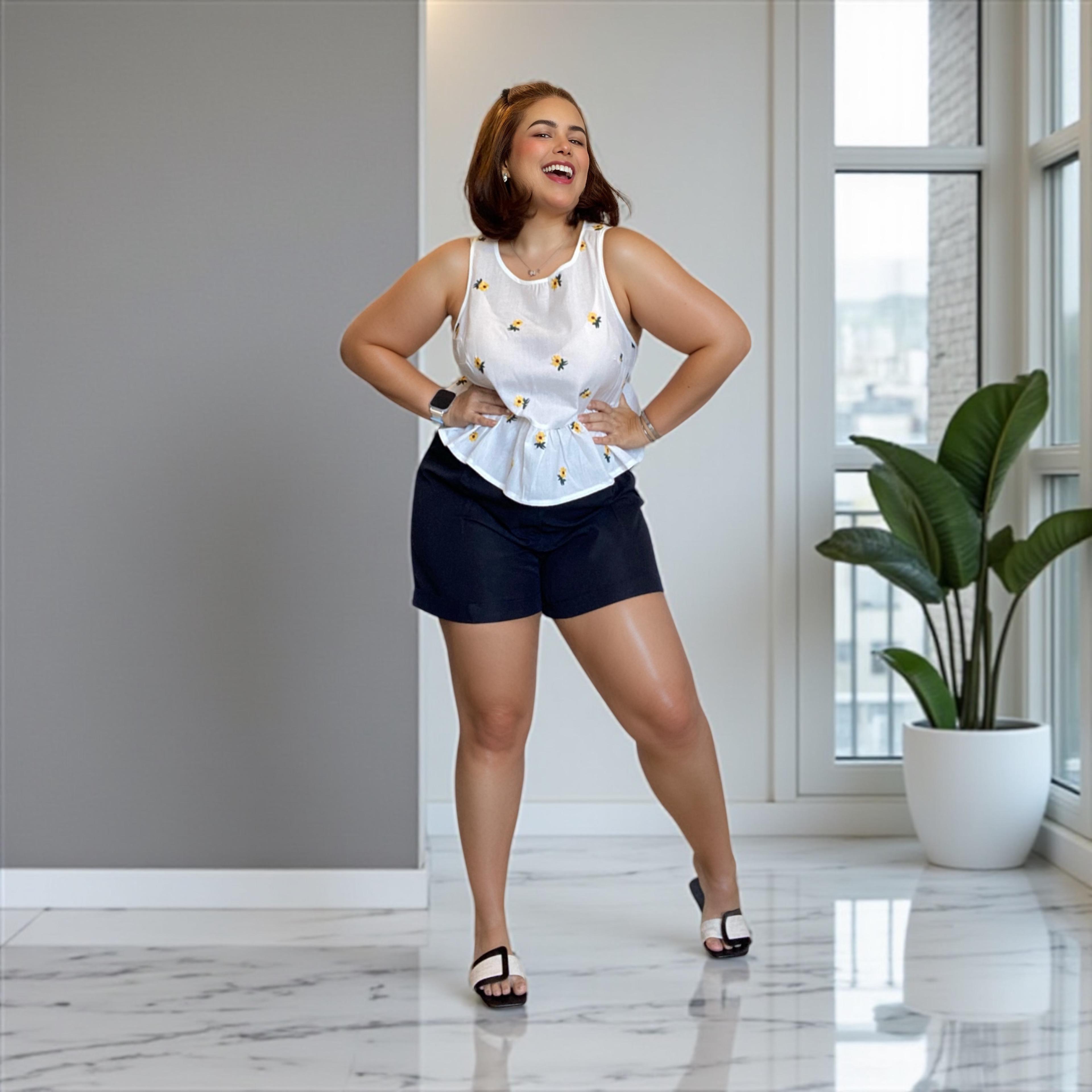 Short de tiro alto con pinzas negro